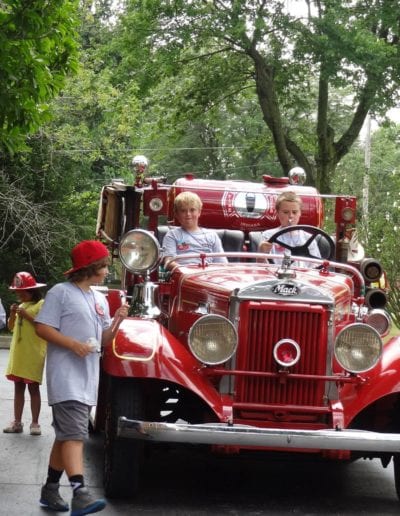 Red Car Parade | Stewart & Stewart Attorneys